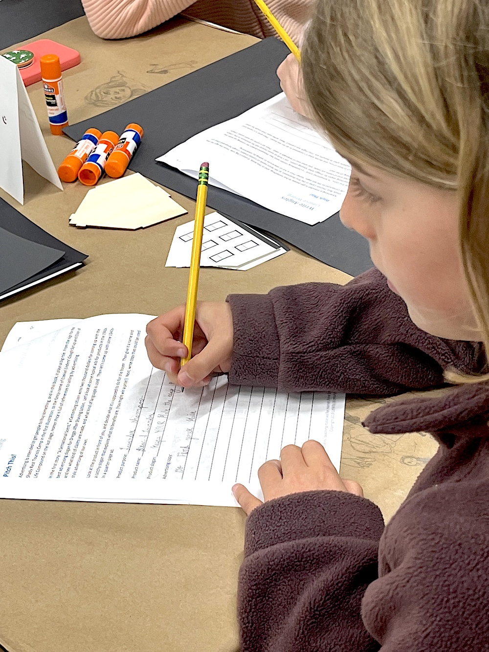 Creative activities projects and worksheets for teaching HOMER PRICE by Robert McCloskey - worksheet for writing product slogan and marketing copy, ad