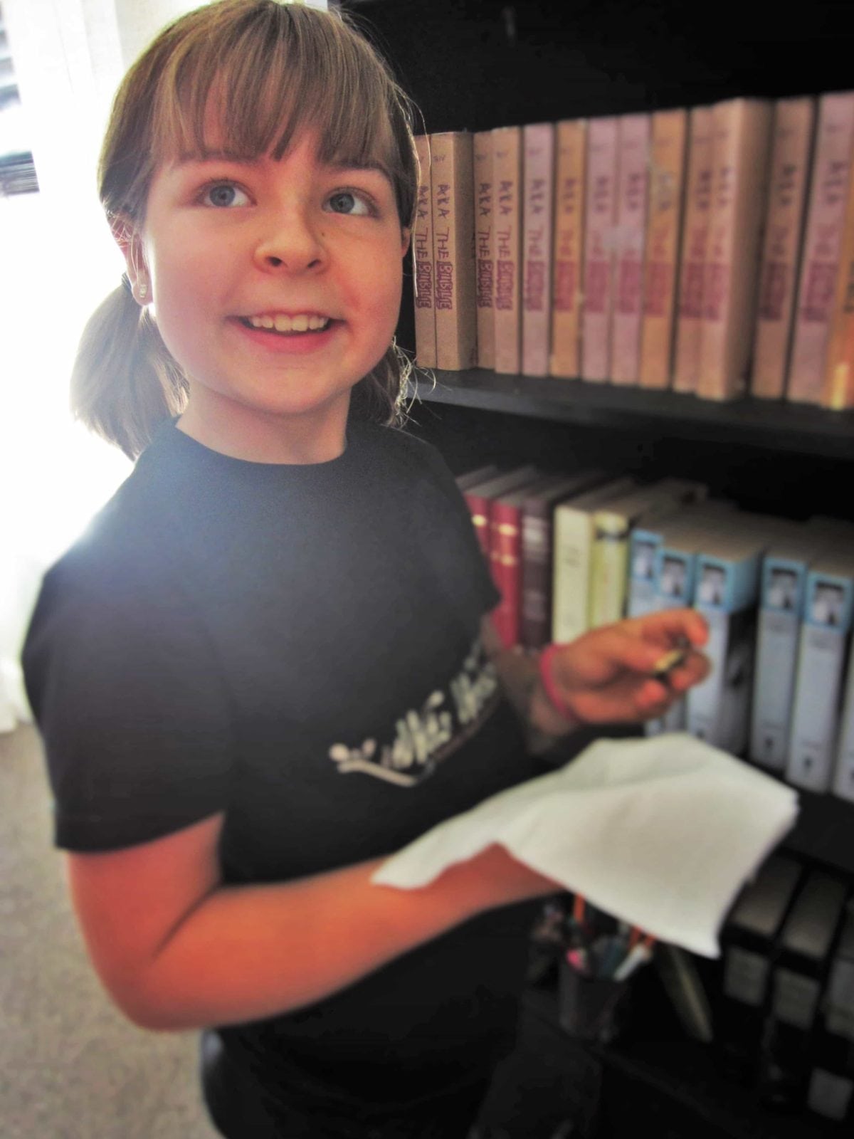 Child finding a button while dusting, as Sarah did in ALL-OF-A-KIND FAMILY by Sydney Taylor - a creative teaching idea from LitWits Workshops