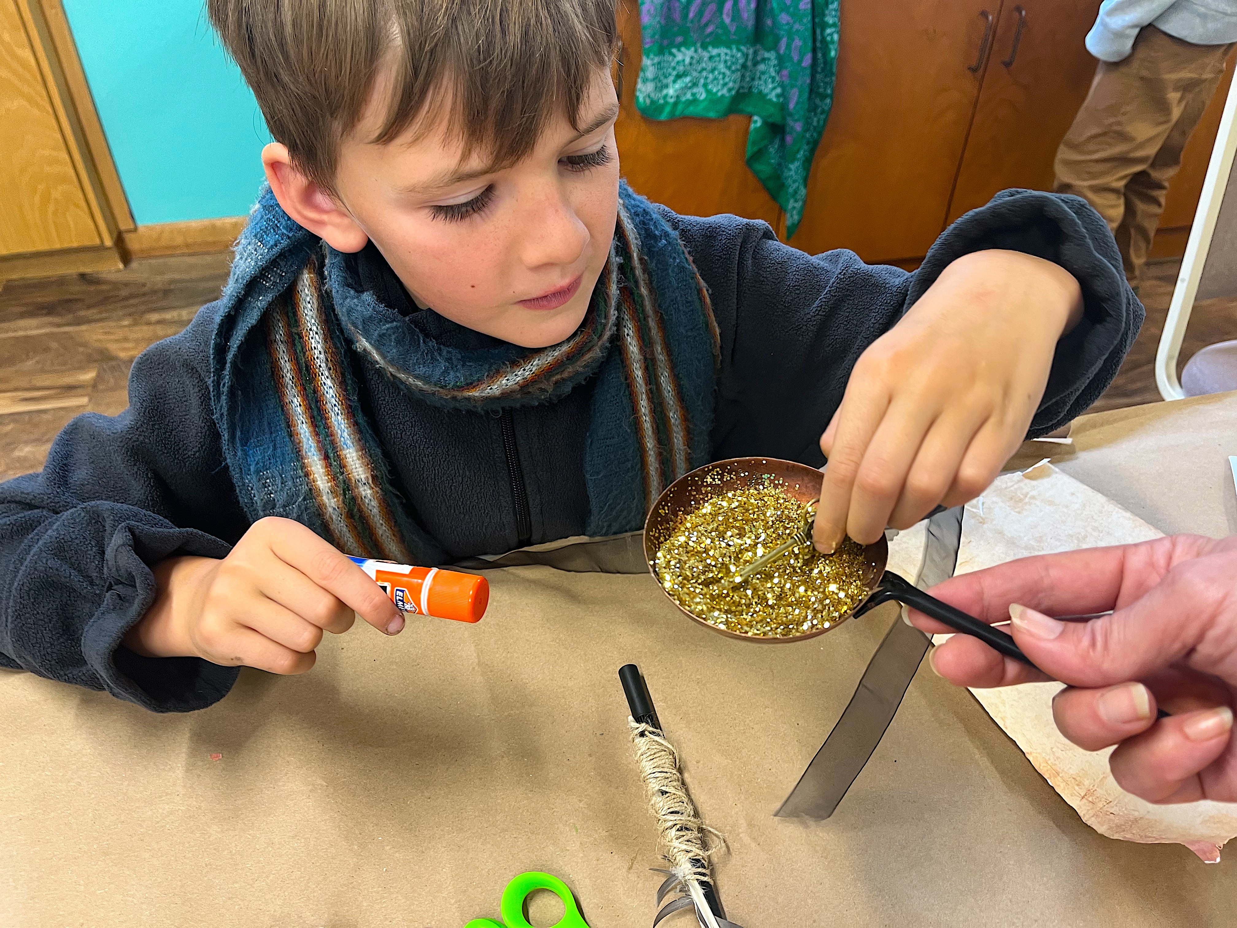 LitWits creative teaching idea for THE TRUMPETER OF KRAKOW by Eric P. Kelly - Transmute brass into gold! (dipping a brass key into glitter)