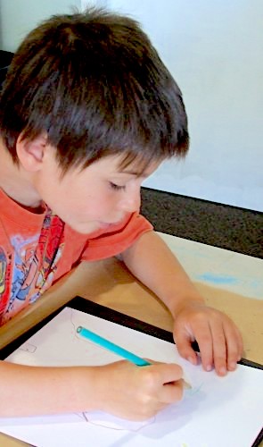 Child drawing Tolkien's Lonely Mountain - creative teaching idea from LitWits Workshops