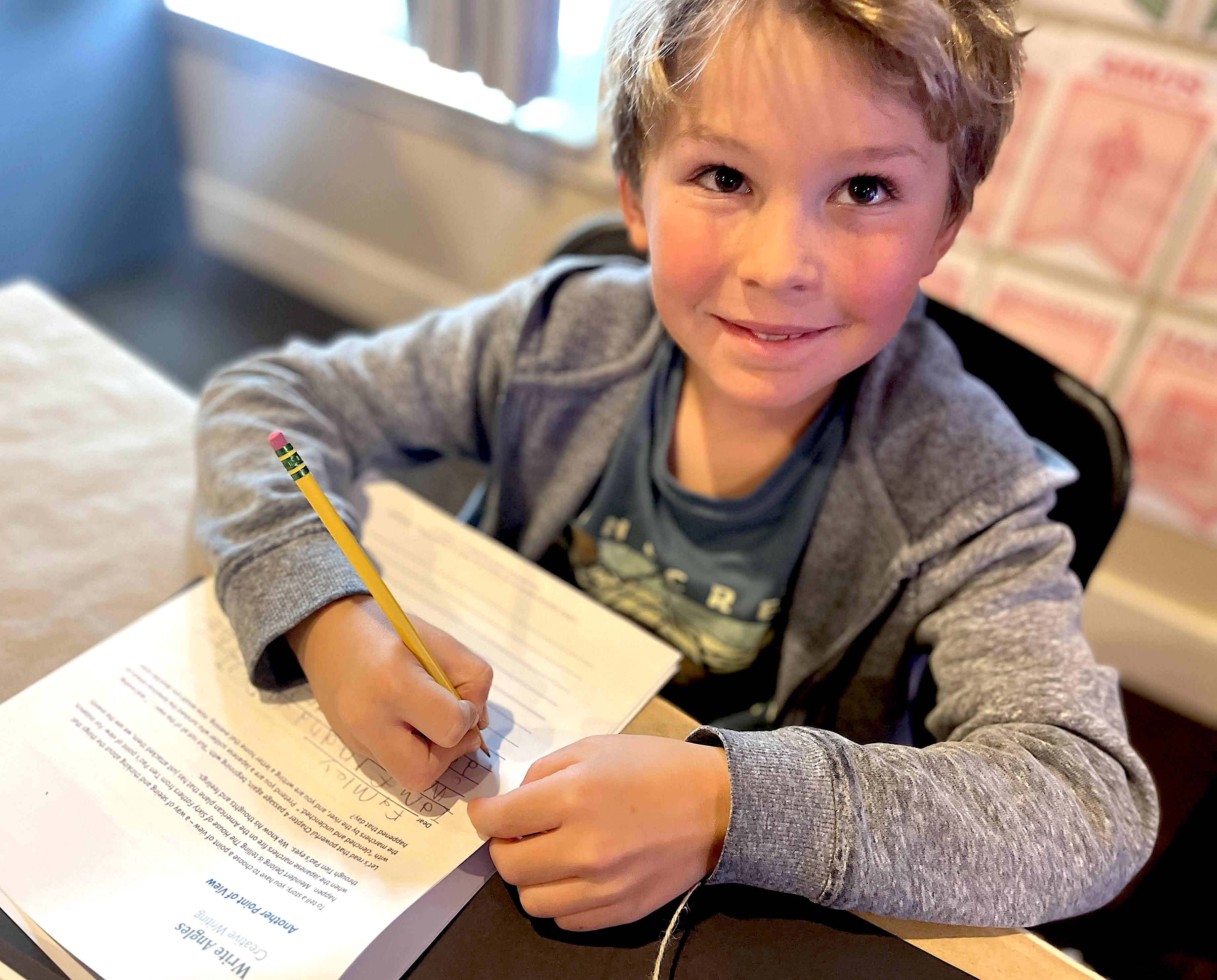 Child doing a creative writing activity for A SINGLE SHARD by Linda Sue Park - from LitWits Workshops